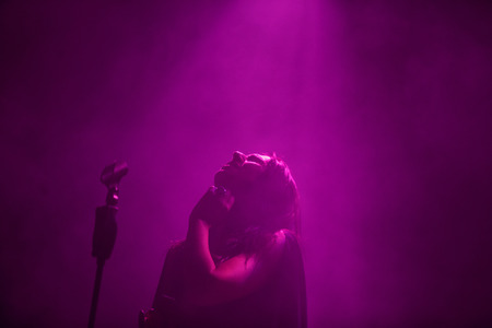 KYIV, UKRAINE - DECEMBER 5: The famous Ukrainian singer Jamala looks up with eyes closed presenting her new album "Podykh" (Breath), 5 December 2016, International Center of Culture and Arts (October Palace)のeditorial素材