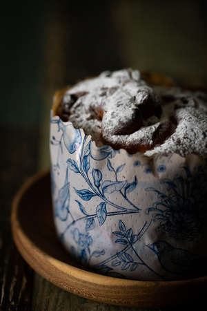 Craffin on a table in a wooden bowl on a dark background of woodの写真素材