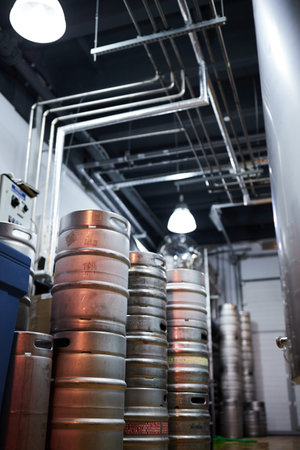 Equipment for the production of craft beer, containers for fermentation in the climatic chamber, pressure gauge with tubes and stainless steel tanks.の写真素材