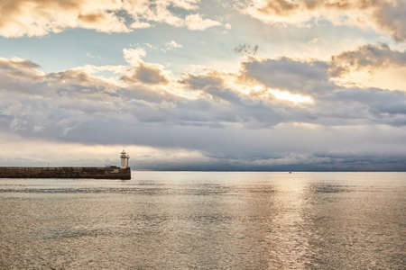 Sea embankment and lighthouse in the city of Yalta. Black Sea. Front view.の写真素材