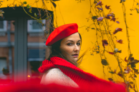 Portrait of a young attractive woman, hello autumn, the beginning of the season. Front view.