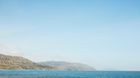 The sea and rocks on the south coast. Crimea, a landscape on a sunny day. Front view.