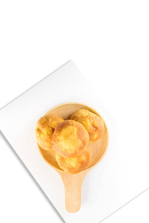 Loaf pastries, bread on plank isolated on whiteの写真素材