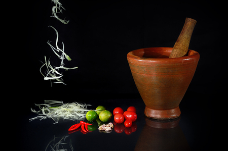 Thai papaya salad material (SomTum) on black background & raw material  popular thai food.の写真素材