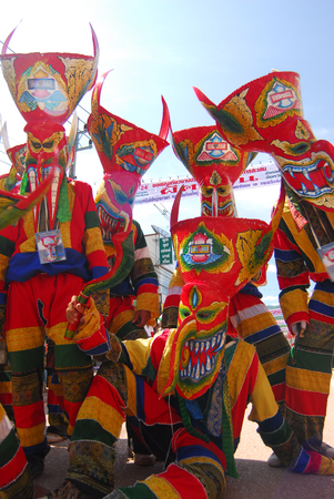 PHI TA KHON Festival Ghost Festival on June in Loei province young people dress in spirit and wear a mask, sing and dance holiday in LOEI, THAILANDのeditorial素材