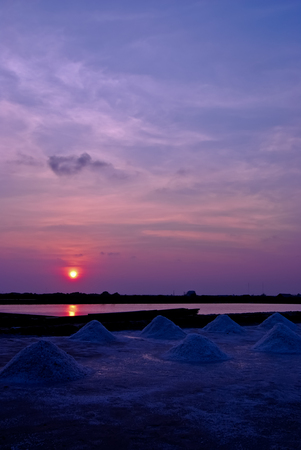 Beautiful sunset salt farming (Naklua) in the coastal, Phetchaburi provinces of Thailandの写真素材