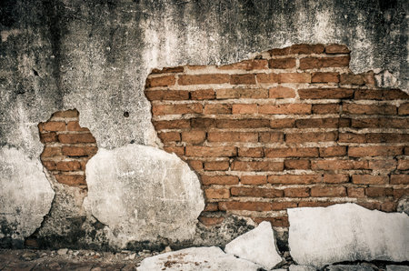 cracked concrete vintage brick wall background, old dirtyの写真素材