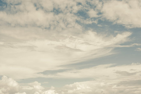 white fluffy clouds with background blue sky