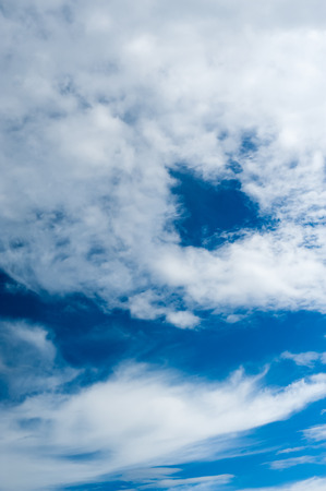 white fluffy clouds with background blue skyの写真素材