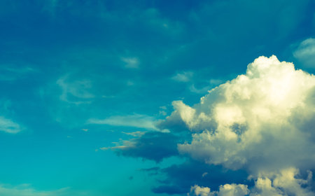 white fluffy clouds with background blue sky