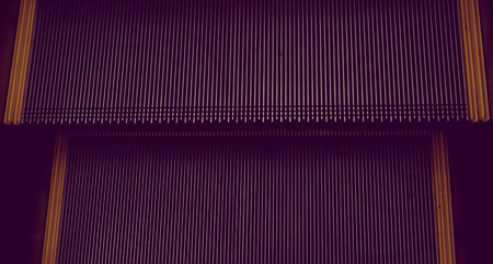 abstract escalator in shopping mall, Moving up staircase, yellow bands. metal line steelの写真素材