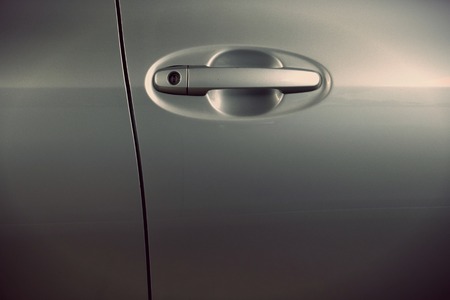 Handle of a silver car doorの写真素材