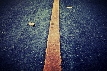 New asphalt texture with yellow line on roadの写真素材