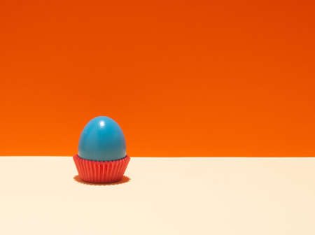 Easter blue egg on a colorful background. Copy space 2021.の写真素材