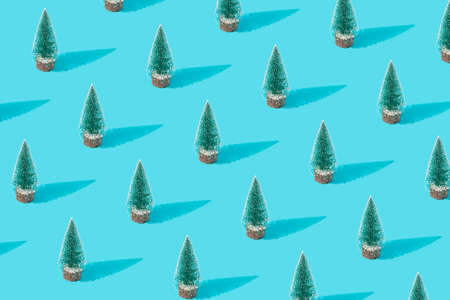 Christmas tree pattern on a blue background. Christmas composition. Xmas idea. 2022の写真素材