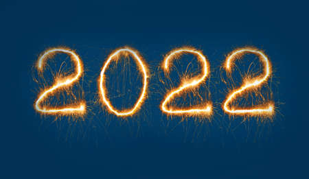 Sprinklers on a dark blue background. New Year 2022の写真素材