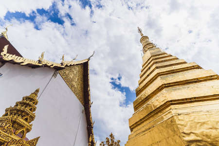 Golden pagoda of Wat Prathat Cho Hae, Phrae, Thailand.の写真素材