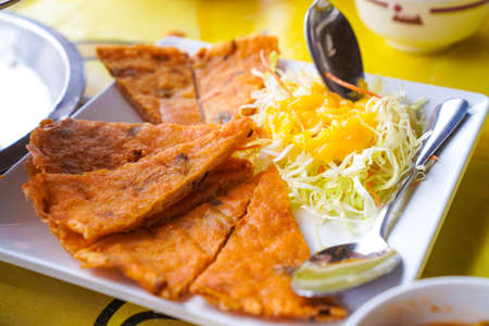 Crispy shrimp pancakes, Asian food named "Goong Gra Buang" is often eaten as an appetizer.の写真素材