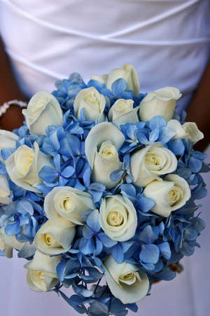 brides wedding flowers blue flowers and white rosesの写真素材