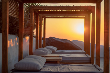 Looking through daybed at sunset, Santorini Greeceの写真素材