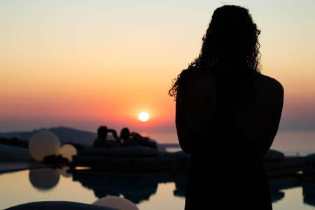 People watching sunset, Santorini, Greeceの写真素材