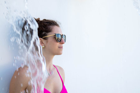 Beautiful woman in patio water feature