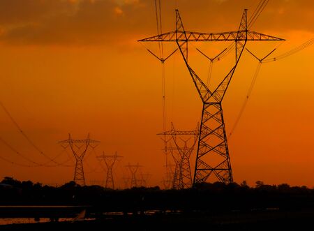 Large electricity poles on a sunny afternoon in Indonesiaの写真素材