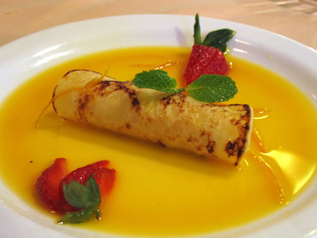 Pancakes Suzette with orange sauce