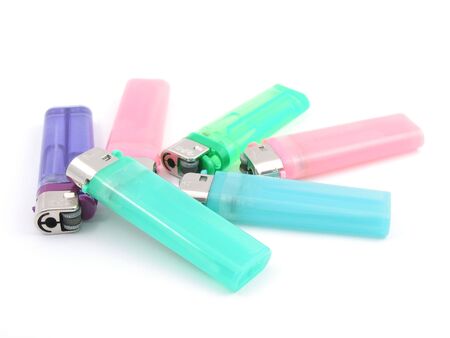 Colorful lighters in isolated whiteの写真素材