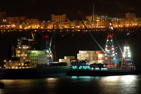 Cargo ships in the habour work at night