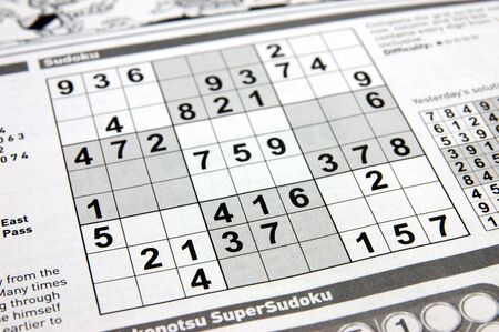 Close up of a sudoku puzzle on newspaperの写真素材