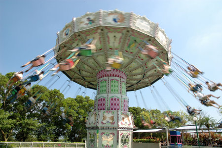 Carousel swing in the skyの写真素材