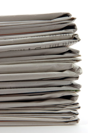 Stack of newspaper in isolated white background