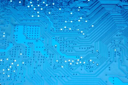 Close up of computer circuit board in blueの写真素材