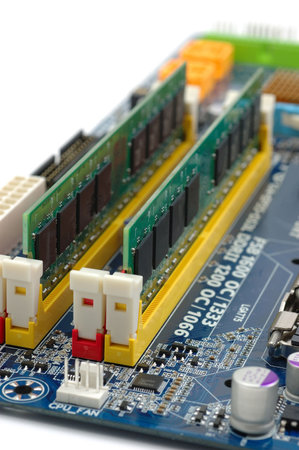Closeup of computer RAM installed on a motherboard