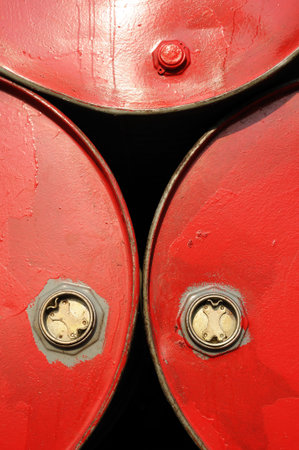 Close up of red industrial drumsの写真素材