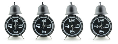 Black alarm clocks in isolated white background