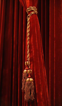 Close up of red curtain with vasselの写真素材