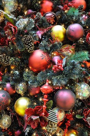 Background of christmas ornaments on treeの写真素材