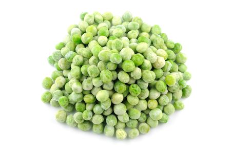 Frozen green peas in isolated white backgroundの写真素材