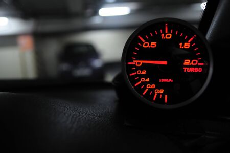 Close up of an automobile turbo gaugeの写真素材