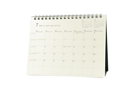 Multilingual desktop calendar July 2011 in isolated white backgroundの写真素材