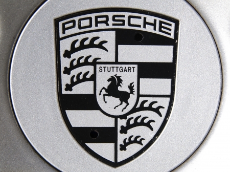 Porsche logo on an automobile. Porsche is a German automobile manufacturer.のeditorial素材