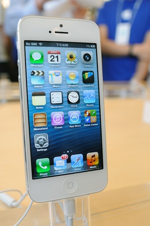 Close up of white iPhone 5 display in Hong Kong Apple storeのeditorial素材