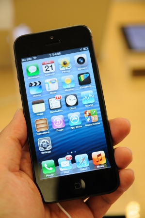 Close up of black iPhone 5 display in Hong Kong Apple storeのeditorial素材