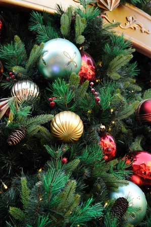 Close up of christmas ornaments on treeの写真素材