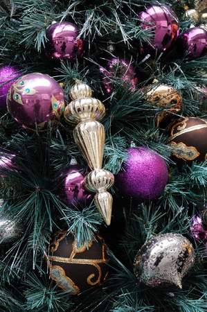 Close up of christmas ornaments on treeの写真素材