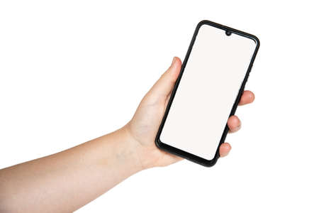 Close-up of woman's hand isolated on white background, holding a phone.の写真素材