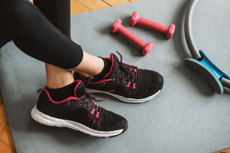 Top or flat view  of black running shoe with dumbbells. Background with copy space area. Healthy concept.の写真素材