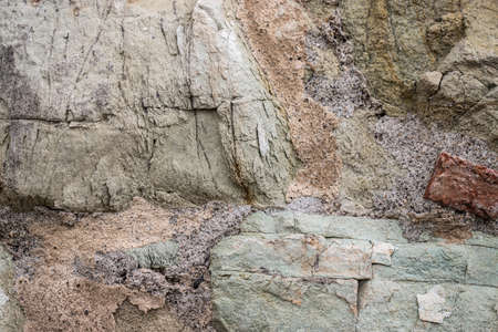 Texture of a stone wall. Old castle stone wall texture background. Stone wall as a background or texture. Part of a stone wall, for background or texture.の写真素材